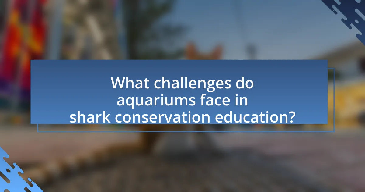 What challenges do aquariums face in shark conservation education?
